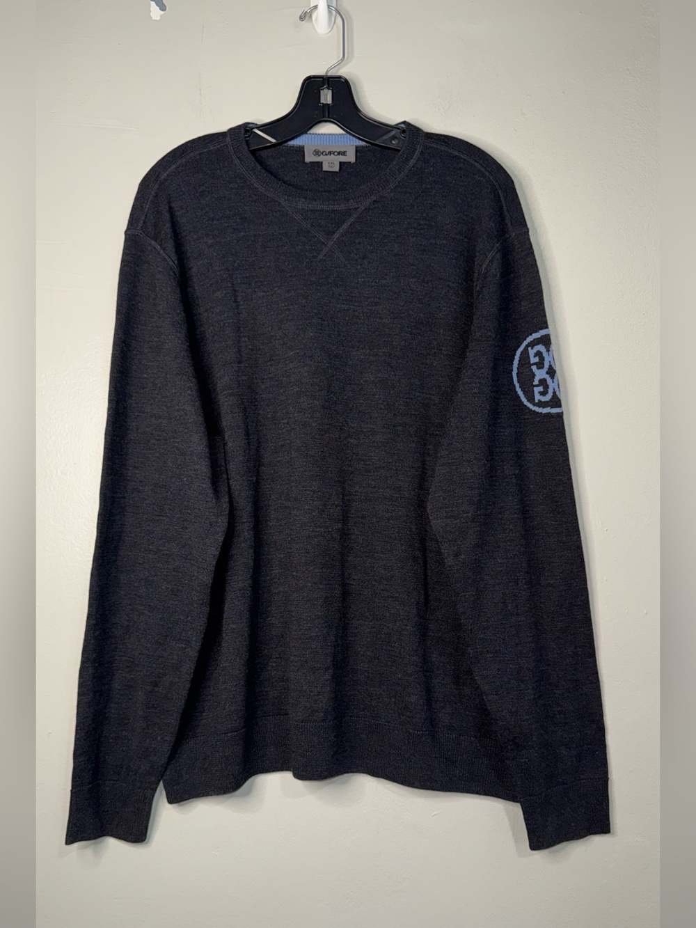 G/FORE Black Crewneck Sweater with Light Blue Sleeve Emblem